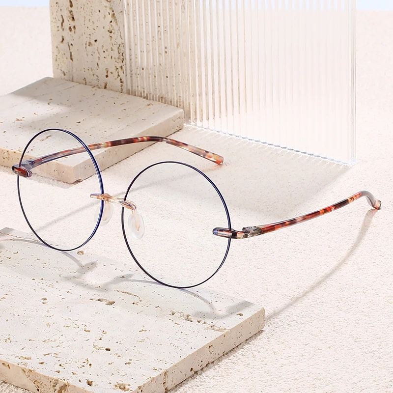 hs2159 8 rimless round pc frame good 1.webp HS2159-8 Rimless Round Frame Glasses for Blue and Pink Frame for